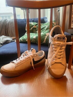 Nike Women's Low-Top Sneakers in Cream with Black Swoosh